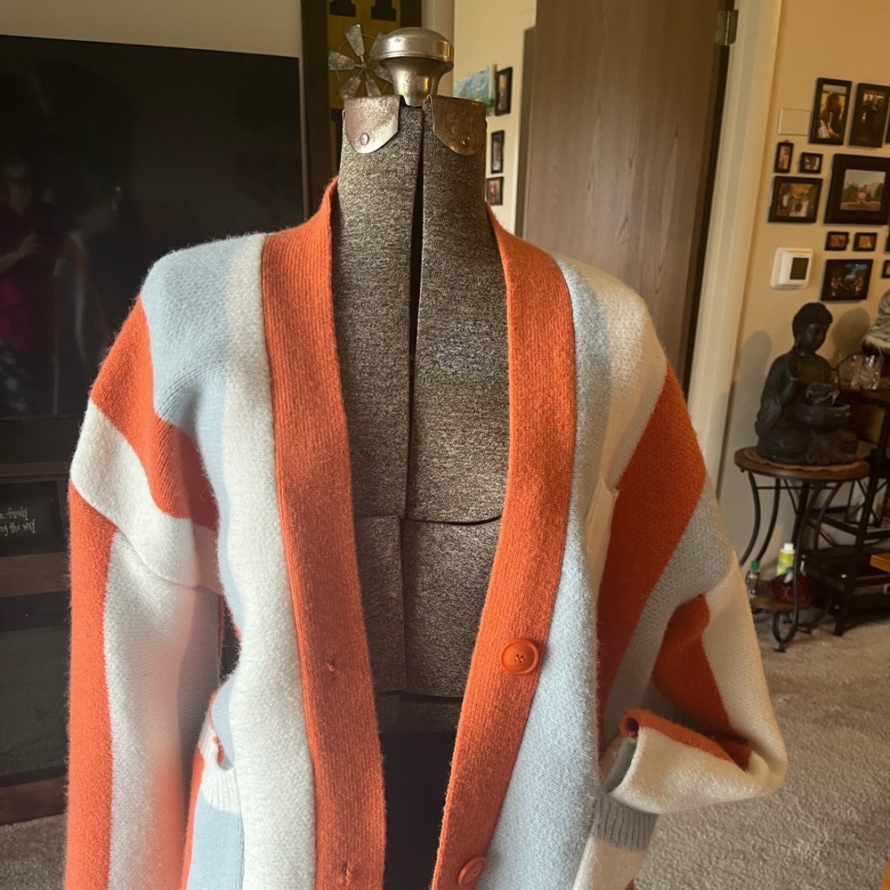 Orange/white/blue Oversized Striped Cardigan.
L-XL
Jascls brand